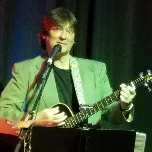 Pastor Robert on Guitar